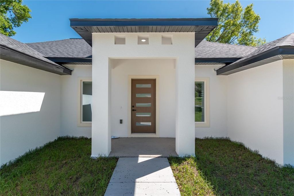 Photo of 11375 SE 74th Avenue, Belleview, FL 34420 (MLS # O6392525)