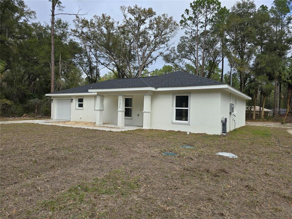 Photo of 131 Fisher Road, Ocklawaha, FL 32179 (MLS # OM717563)
