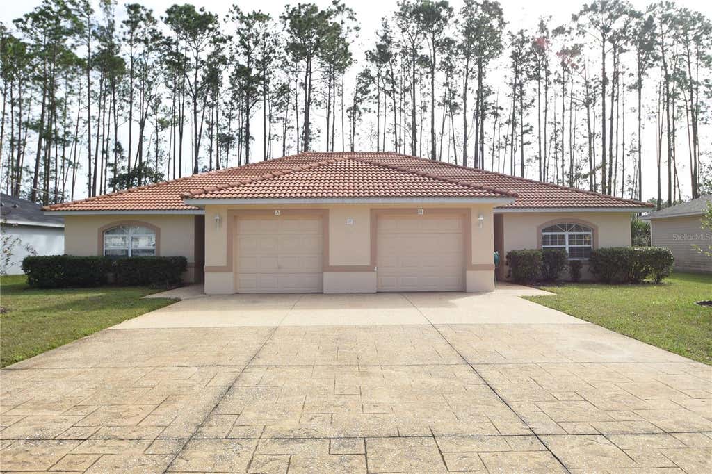 Photo of 87 Pony Express Drive #A &amp; B, Palm Coast, FL 32164 (MLS # FC320691)
