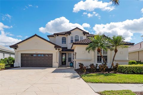 Photo of 5241 Grand Palmetto Way, North Port, FL 34291 (MLS # C7515344) Photo of 5241 Grand Palmetto Way, North Port, FL 34291 (MLS # C7515344)