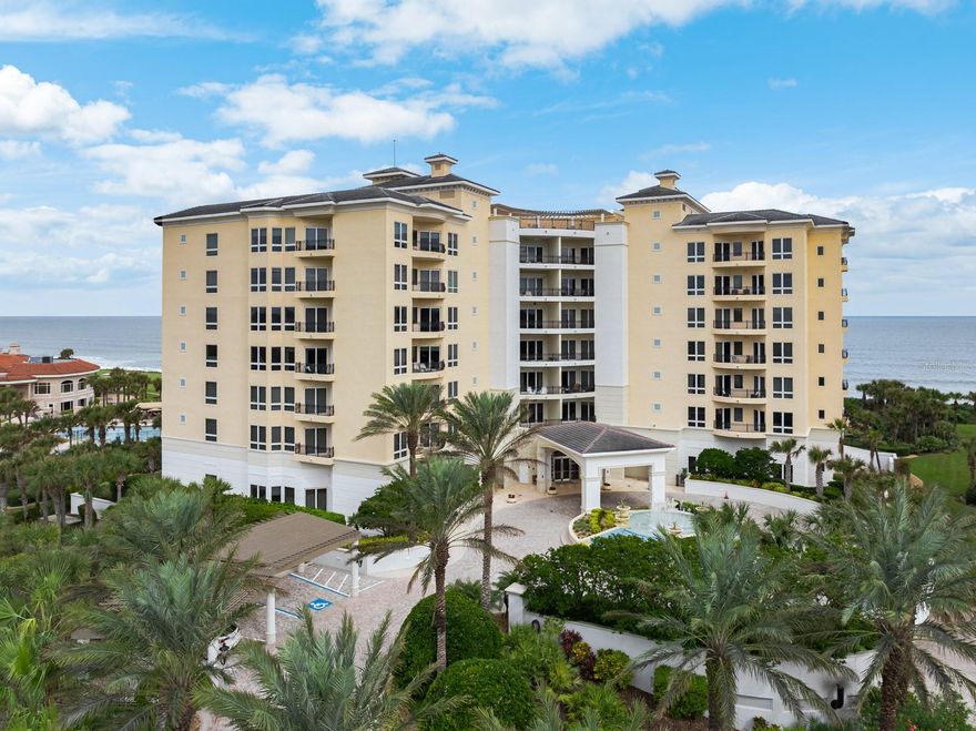 Recent Price Improvement! Your dream is living on the first floor of a high end oceanfront condo. You’ll have a large, wrap-around fenced patio that’s perfect for entertaining, pets, and watching the ocean. Plus, it’s just a short walk to the beach, clubhouse, pool, croquet and bocci courts, fire pit seating, hot tub area and Links golf course.  You’re living in luxury in the private, gated, guarded, oceanfront, golf community called Hammock Dunes! This exclusive 26-unit condo complex, known as Le Jardin, is the ultimate condo experience. The one-of-a-kind, customized first-floor unit is sure to wow the most discerning buyer. With top-notch interior finishes, custom hardwood floors, window treatments, a gas fireplace, a gourmet kitchen with stainless appliances and custom cabinetry, a gas cooktop, and solid wood doors throughout, this unit creates an ambiance of elegance and comfort. The high ceilings and spacious open living areas make it feel like you’re living in a dream.  Ample East facing windows provide broad ocean views.  The methodical sound of waves gently hitting the shore add real ambiance to your morning coffee or evening wine on the patio.  And the amenities don’t stop there! There’s a state-of-the-art theater room, library, fitness center, resistance pool, wine cellar with tasting alcove and your personal wine locker, social room, and a two car garage with a climate-controlled storage room. Membership in the Platinum-rated Hammock Dunes Club is not included, but may be purchased separately.
