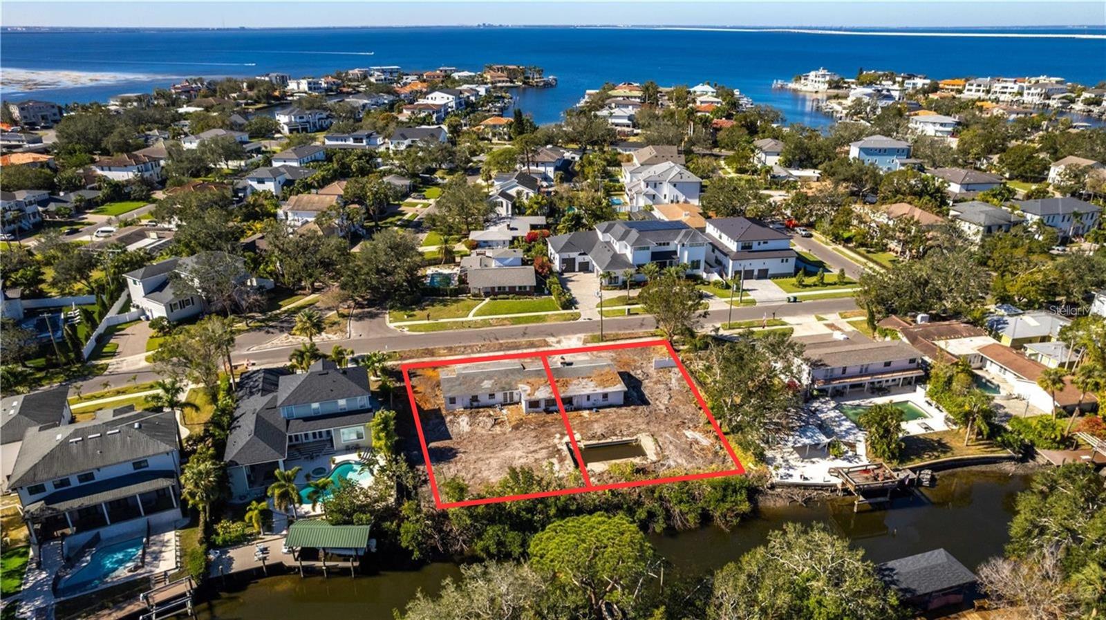 Auction Property. Property will be sold free and clear of all liens. Listing price is the estimated opening bid. Auction held live on site at the house Saturday July 12 at noon. Preview and registration at 11:00 am. Seize the rare opportunity to build on this prime double lot nestled within one of South Tampa's most coveted multi-million dollar neighborhoods. Lots have been approved and can be sold separately. This premium lot provides immense flexibility for an optimal construction possibility. Surrounded by modern, upscale homes, the property's location ensures lasting value. Enjoy the convenience of living just moments from the International Plaza, Westshore District, Hyde Park, and Downtown Tampa's vibrant dining, shopping, and entertainment. While the current structure on the lot has been impacted by recent storms, this is your chance to start fresh with a blank canvas on a rare double lot. Capitalize on the demand for new construction in this high-end market while this is an investment opportunity you will not want to miss!