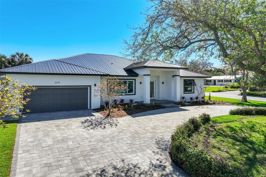 Rarely does a home check every box, and then some. This stunning new construction residence in the coveted Harbor Bluffs neighborhood of Largo presents an exceptional opportunity for the discerning buyer seeking luxury finishes, superior storm-rated construction, and the ultimate Florida lifestyle, all with no flood insurance required.
Positioned on an elevated, oversized corner lot, this beautifully designed 4 bedroom, 3.5 bathroom home, with a versatile flex space, ideal as a 5th bedroom or private home office, offers the space, sophistication, and flexibility today's buyers demand. Soaring 10-foot ceilings and an open, light-drenched floor plan create an immediate sense of arrival from the moment you step inside.
At the heart of the home, the gourmet kitchen is appointed with quartz countertops, a Thermador refrigerator, and a professional Wolf gas range, delivering a culinary experience worthy of the finest residences. A tankless water heater ensures on-demand comfort and energy efficiency throughout.
Built for both beauty and resilience, the home features a striking metal roof, offering durability and exceptional insurance savings, paired with impact-rated Pella windows that provide peace of mind, while flooding the interiors with natural light and superior energy efficiency.
Every element of this home has been thoughtfully selected to deliver long-term value: non-flood zone (X zone) designation and elevated construction, cornerstones of smart ownership on the Gulf Coast.
Perfectly situated in Harbor Bluffs, just minutes from the white sands of Clearwater and Indian Rocks Beach, with effortless access to Pinellas County's premier waterfront dining, boutique shopping, and top-rated schools.