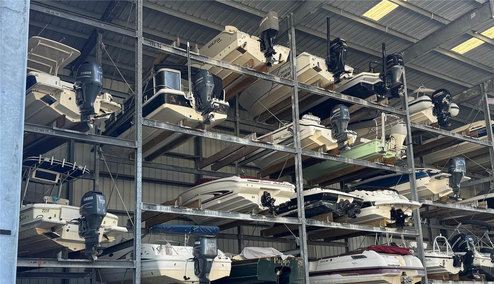 Own your own rack at beautiful Gulf Harbor Marina on the intercoastal waterway in Nokomis just a short boat ride to the Venice jetty and out to the gulf. Buy for your own boat or for an investment; easy to rent on a monthly basis. This rack is the 2nd rack up, dimensions are 9'8" W X 25' D X 10' H. The maximum vessel dimensions for this rack are 8.8' W X 25' D X 8'6". The monthly maintenance fee is $404. The marina is designed with your boat's safety and security in mind. The outside work racks are for you to do minor work on your boat at your convenience. There is a fish station for you to clean your catch of the day, rolling carts to help carry your gear to and from your personal vehicle, and a designated parking area. Need fuel, bait, or ice? Pull up to the fuel dock after you launch your boat and all three are available for purchase!