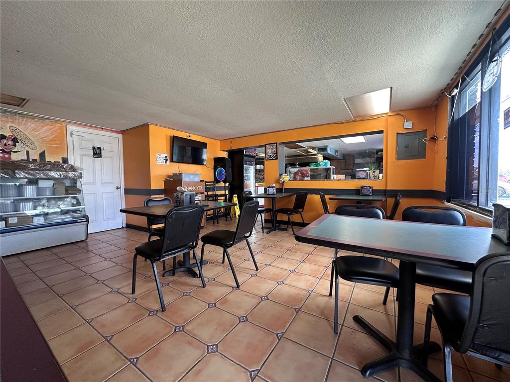 Photo of 9852 E Colonial Drive, Orlando, FL 32817 (MLS # O6358297)