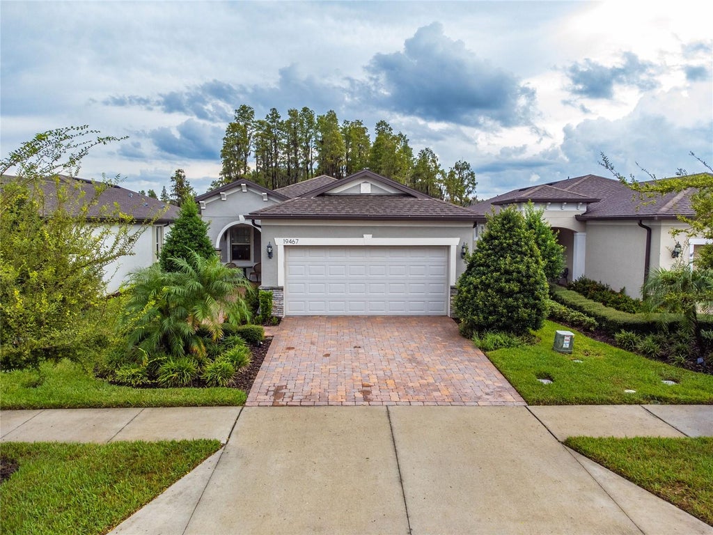 Photo of 19467 Ship Wheel Way, Land O Lakes, FL 34638 (MLS # TB8559269)