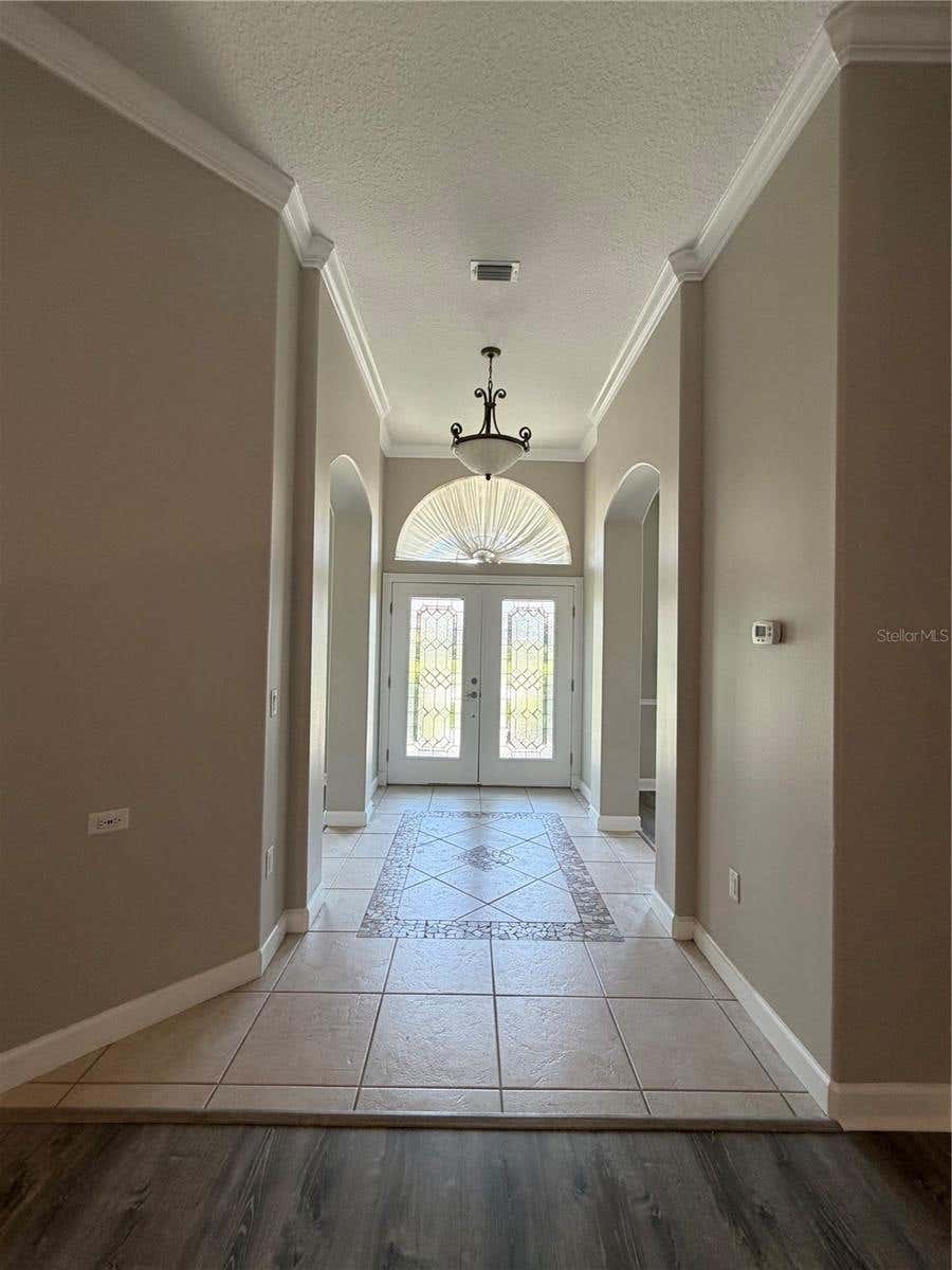 Photo of 1070 Ceasars Court, Mount Dora, FL 32757 (MLS # O6434456)