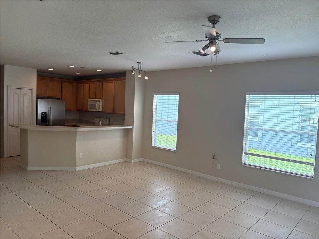 Photo of 9428 Flowering Cottonwood Road #660, Orlando, FL 32832 (MLS # S5153961)