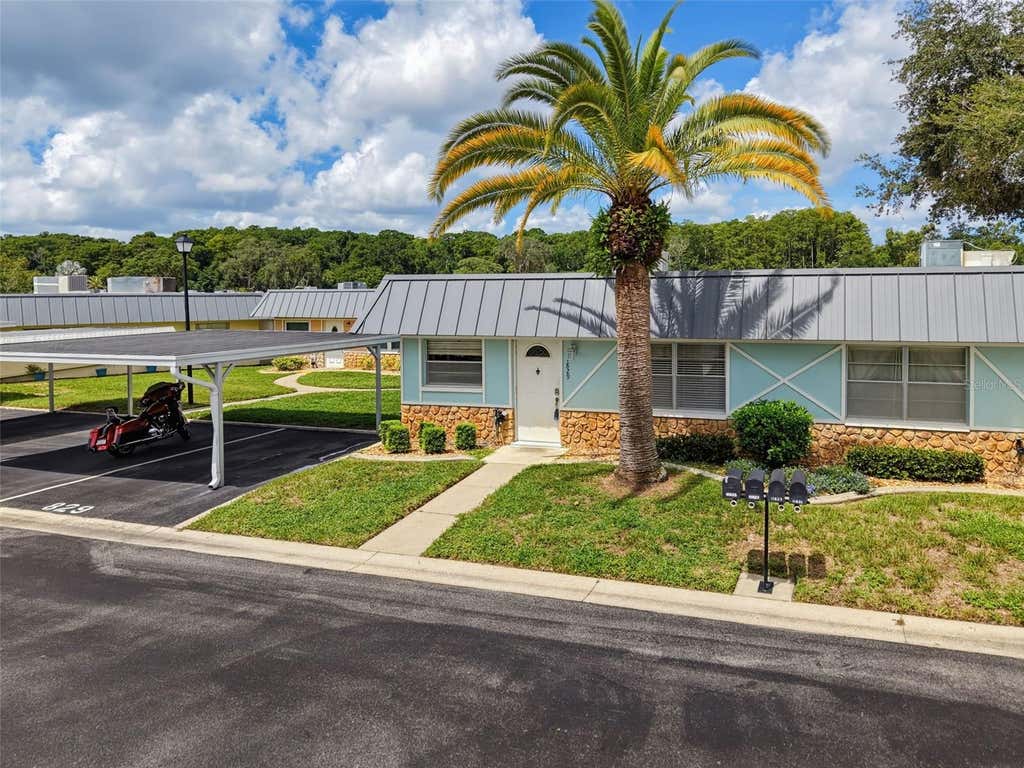 Photo of 11829 Carissa Lane #A, New Port Richey, FL 34654 (MLS # TB8537474)