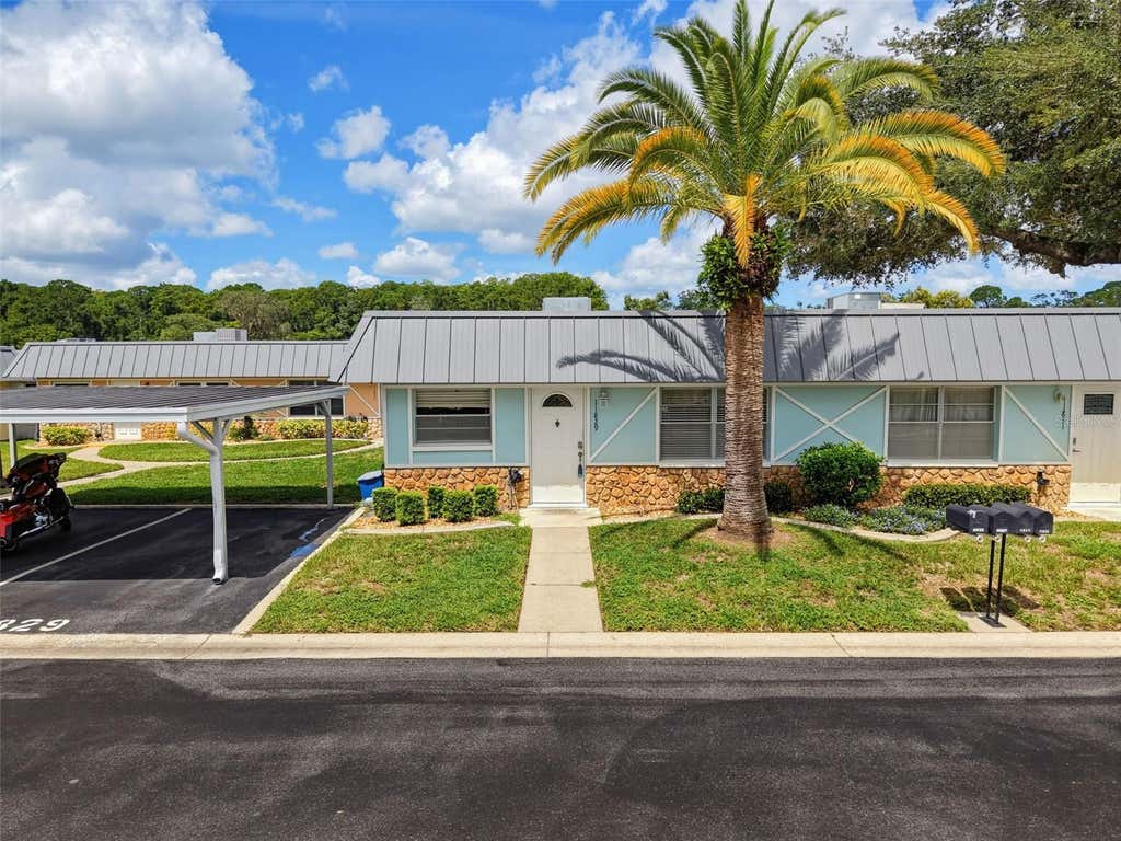 Photo of 11829 Carissa Lane #A, New Port Richey, FL 34654 (MLS # TB8537474)