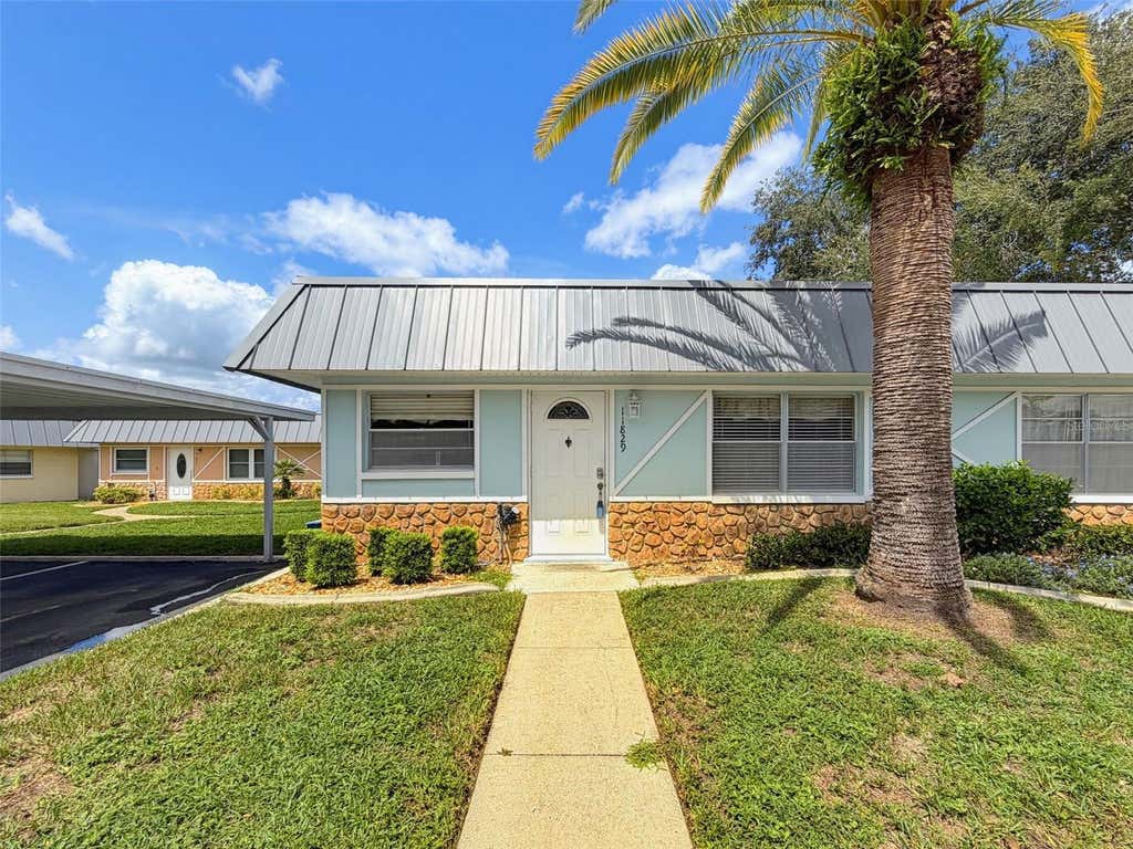 Photo of 11829 Carissa Lane #A, New Port Richey, FL 34654 (MLS # TB8537474)