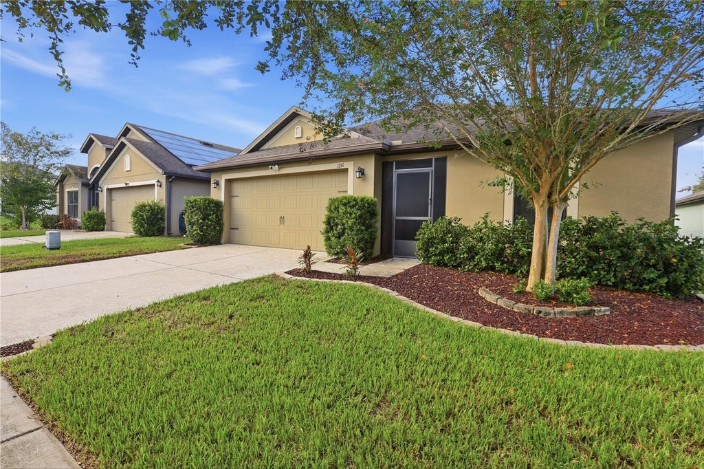 Photo of 1151 Woodlark Drive, Haines City, FL 33844 (MLS # O6449562)