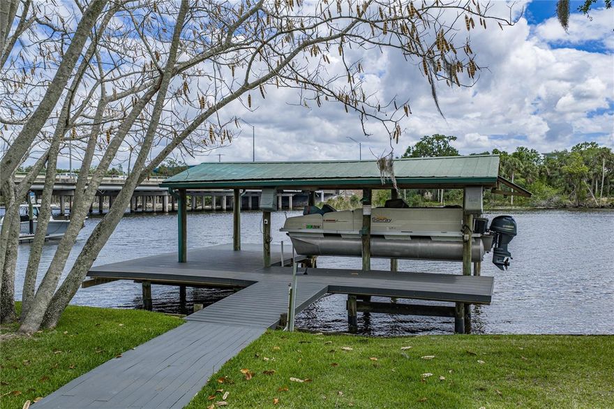 ALAFIA RIVERFRONT HOME **  NEW PRICE>>>>> PONTOON BOAT & MOTOR & FURNSHINGS NEGOTIABLE TO BE INCLUDED ** ROOM TO PARK YOUR RV ON LARGE LOT. SHOW ROOM CONDITION*** IMMEDIATE OCCUPANCY. Located on the North side of the river in Riverview, off Riverview Drive between the Hwy 301 Bridge and I-75, in the wake zone, only 10 minutes to Tampa Bay & on to the Sunshine Skyway Bridge...  YOU COULD GO TO CUBA FROM YOUR BACK DOOR. For your privacy, at the end of a dead-end street. This home is like new, IMMACULATE with a flexible floor plan. Detached garage with storage space plus a detached storage shed along with ample, paved parking area. Room dimensions to be verified. This is one of the Alafia River jewels currently offered on the river. Tax records indicate year built 1930/1977 effective year built. 1930 may be from original home no longer on property.