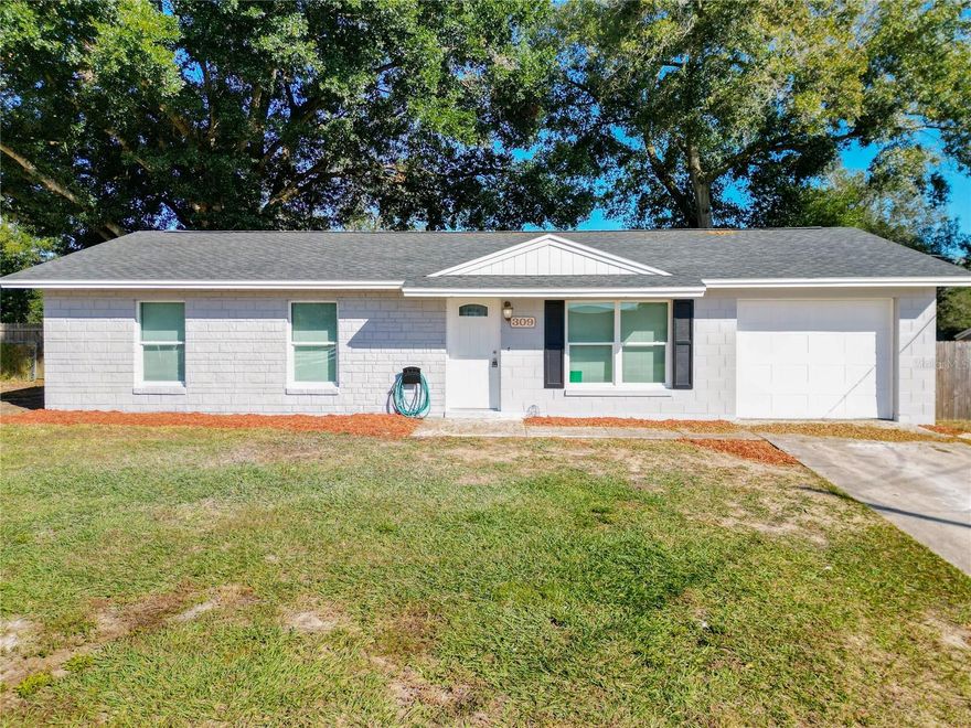 Looking for your dream home? Look no further! This fully remodeled home that features all new vinyl flooring, a new roof, new AC, and a new hot water heater is located in the desirable area of Lady Lake and boasts a prime location just off 441. With easy access to shopping, dining, and entertainment in the area, you'll love everything this home has to offer. Step inside and discover a spacious and welcoming interior that's perfect for families of all sizes. The kitchen has all new appliances. The living room is the perfect place to relax after a long day, with plenty of natural light. You'll love the spacious master and 2 other bedrooms, so there's plenty of room for everyone. Outside, you'll find a large fenced backyard that's perfect for entertaining. Don't miss out on this incredible opportunity - all for under $245k!!!!