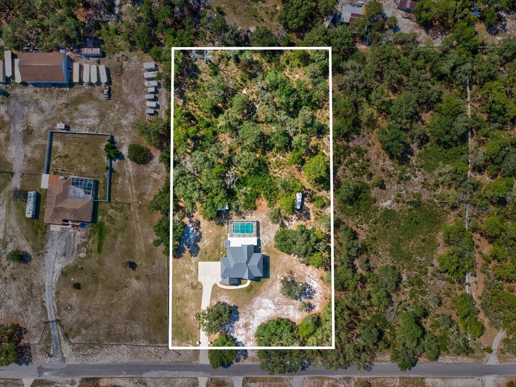 Photo of 15420 Aubrey Avenue, Spring Hill, FL 34610 (MLS # TB8476895)