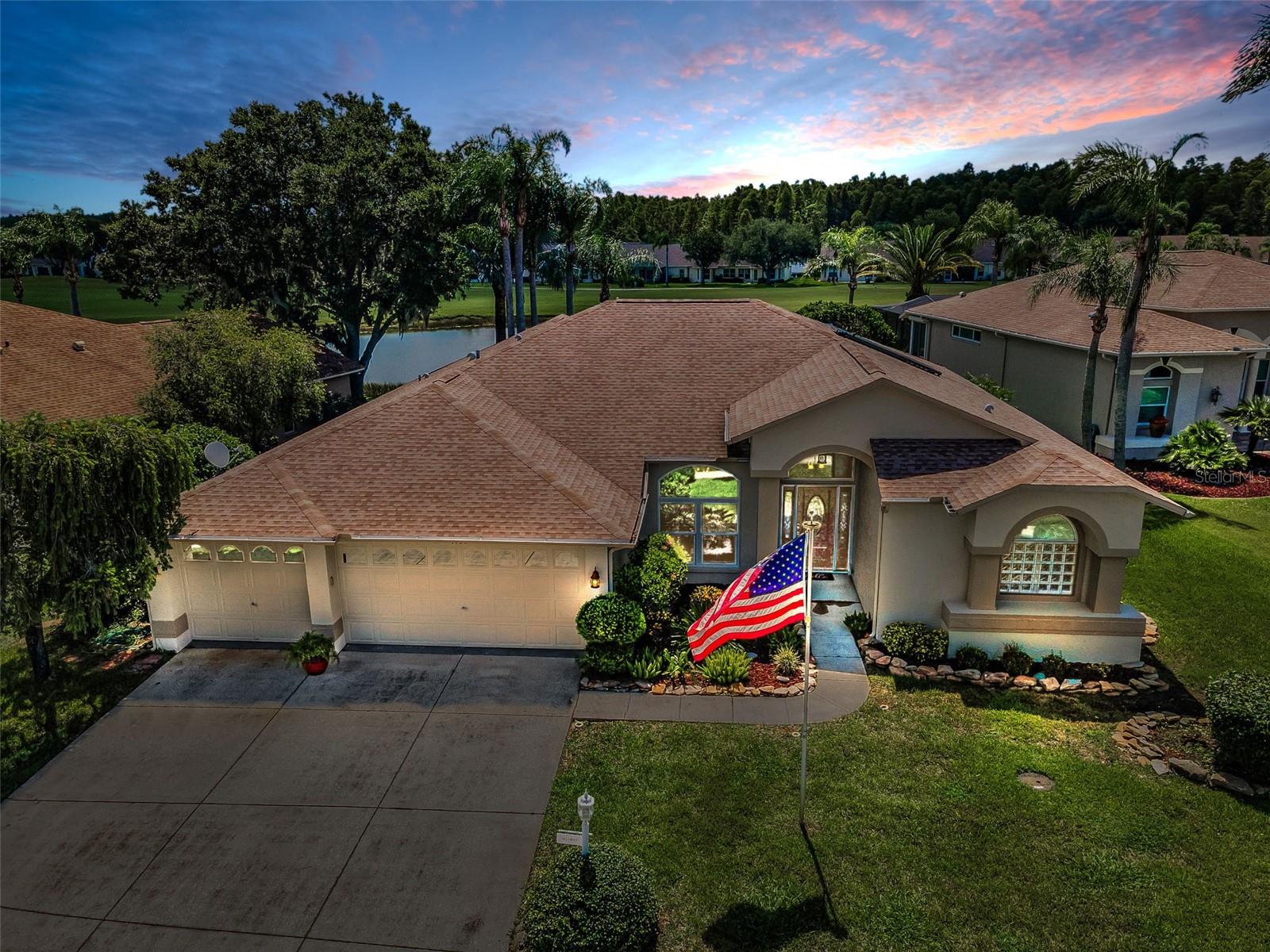 Enjoy the Florida Lifestyle in this Beautifully Updated 3 Bedroom, 2 Bathroom, 3 car garage Estate Home with over 2400 sq ft of living space located in the sought after Golf View Estates in Heritage Springs. The home is beautifully situated on an oversized lot overlooking the 6th fairway and a beautiful pond view. This expanded Kent III model has that "Florida Flow" that everyone is looking for. This home features upgrades galore including a newer custom impact entry door and hurricane impact windows and French doors throughout! The home features beautiful cherry luxury vinyl flooring throughout, except the kitchen and both bathrooms have ceramic tile. There is NO CARPET in this home! As you walk through the front door you can see past the living room and through the 9' French doors leading to the beautiful screened/glass enclosed lanai offering an additional 368 sq ft of covered outdoor living space with a beautiful view of the pond and golf course. The oversized covered lanai overlooks and the large outside patio which is the perfect place for entertaining family and friends. The home features fresh paint, new light fixtures and ceiling fans throughout. The updated kitchen offers granite countertops, newer appliances, including a GAS range and solid wood cabinets and lots of storage, tiled back splash, recessed lighting and a closet pantry and a breakfast nook. Also, offers a large laundry room. This is an open floorplan with the kitchen overlooking the family room with French doors leading out to the covered lanai. The primary bedroom is generous in size and offers two walk-in closets and another set of French doors leading out to the covered lanai. The ensuite bathroom has been beautifully updated with a solid wood oversized double sink vanity. New light fixtures and a huge walk-in tiled shower with glass enclosure. This split floorplan offers two other large bedrooms and an updated guest bathroom. The 3-car garage is oversized and can accommodate 3 full size vehicles or use one space for your golf cart. The home offers new HVAC (2020), new solar water heater (2025) and roof replacement (2014). This home uses solar power 90% of the time with an average electric bill of $80.00. This exquisite, active Community offers a Beautiful Club House with Heated Pool/Spa, Golf Course, Restaurant, Fitness, Swimming, Tennis, Library and many other Community Activities and Events! If you are looking for an active community, this is the home for you! Conveniently located close to beaches, restaurants, shopping, medical and the Tampa International Airport! NOTE: SOME FURNISHINGS ARE OPTIONAL FOR PURCHASE.