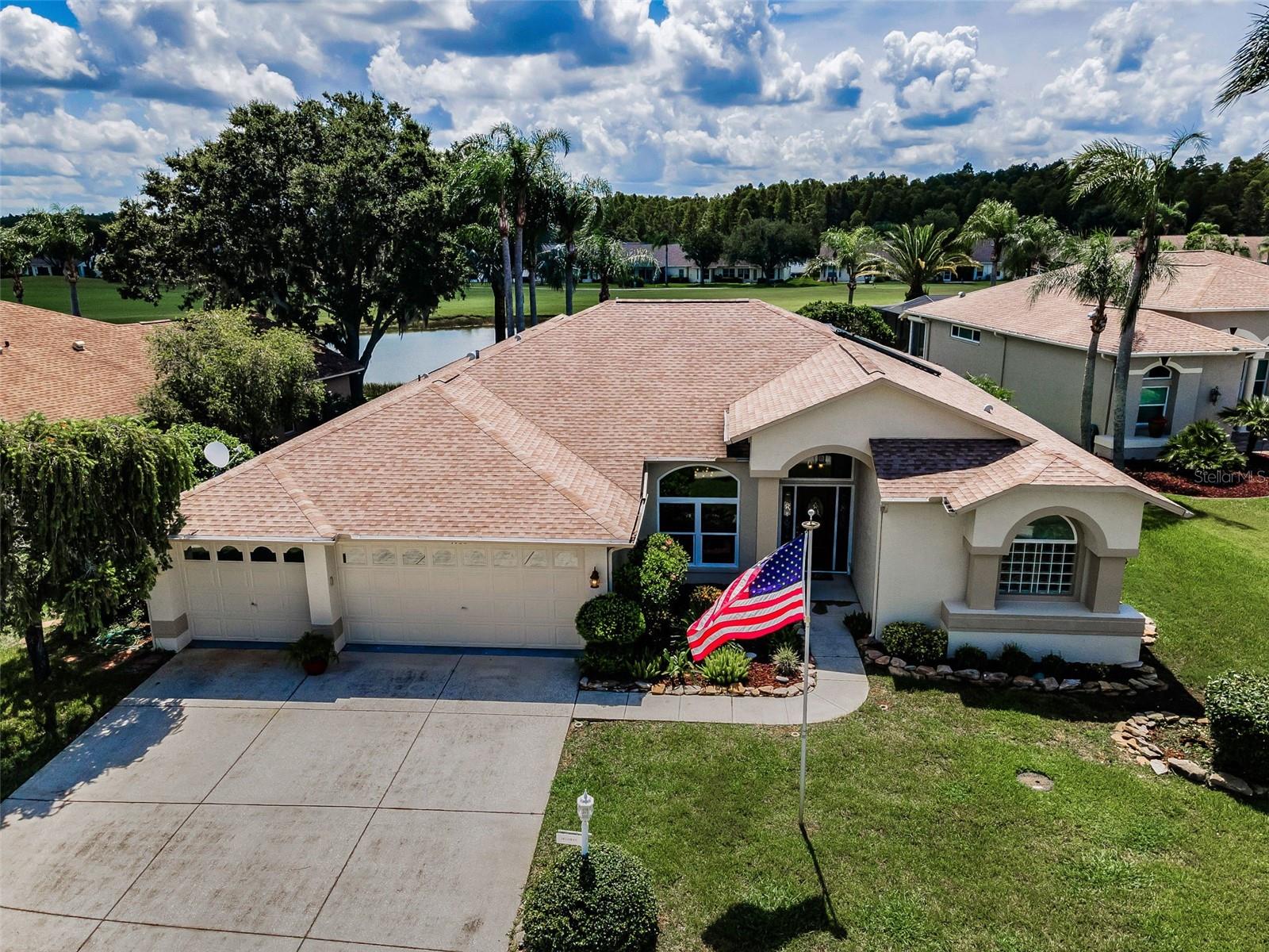 Enjoy the Florida Lifestyle in this Beautifully Updated 3 Bedroom, 2 Bathroom, 3 car garage Estate Home with over 2400 sq ft of living space located in the sought after Golf View Estates in Heritage Springs. The home is beautifully situated on an oversized lot overlooking the 6th fairway and a beautiful pond view. The home offers new HVAC (2020), new solar water heater (2025) and roof replacement (2014). This home uses solar power 90% of the time with an average electric bill of $80.00. This expanded Kent III model has that "Florida Flow" that everyone is looking for. This home features upgrades galore including a newer custom impact entry door and hurricane impact windows and French doors throughout! The home features beautiful cherry luxury vinyl flooring throughout, except the kitchen and both bathrooms have ceramic tile. There is NO CARPET in this home! As you walk through the front door you can see past the living room and through the 9' French doors leading to the beautiful screened/glass enclosed lanai offering an additional 368 sq ft of covered outdoor living space with a beautiful view of the pond and golf course. The oversized covered lanai overlooks and the large outside patio which is the perfect place for entertaining family and friends. The home features fresh paint, new light fixtures and ceiling fans throughout. The updated kitchen offers granite countertops, newer appliances, including a GAS range and solid wood cabinets and lots of storage, tiled back splash, recessed lighting and a closet pantry and a breakfast nook. Also, offers a large laundry room. This is an open floorplan with the kitchen overlooking the family room with French doors leading out to the covered lanai. The primary bedroom is generous in size and offers two walk-in closets and another set of French doors leading out to the covered lanai. The ensuite bathroom has been beautifully updated with a solid wood oversized double sink vanity. New light fixtures and a huge walk-in tiled shower with glass enclosure. This split floorplan offers two other large bedrooms and an updated guest bathroom. The 3-car garage is oversized and can accommodate 3 full size vehicles or use one space for your golf cart. This exquisite, active Community offers a Beautiful Club House with Heated Pool/Spa, Golf Course, Restaurant, Fitness, Swimming, Tennis, Library and many other Community Activities and Events! If you are looking for an active community, this is the home for you! Conveniently located close to beaches, restaurants, shopping, medical and the Tampa International Airport! NOTE: SOME FURNISHINGS ARE OPTIONAL FOR PURCHASE.