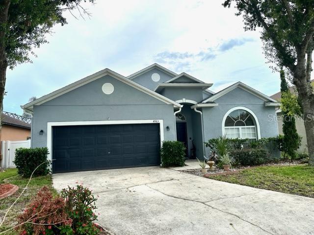 Photo of 4963 Waterside Pointe Circle, Orlando, FL 32829 (MLS # O6448665)