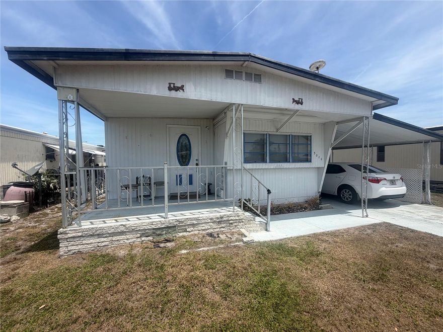 Welcome to 3202 Sego Lane!!  Land Owned!  No Lot Rent!  This 2 bedroom, 1.5 Bath mobile home has been taken care of and is ready for a new Owner!  Brand New A/C is only a couple weeks old and is valued at $11,000....it's top of the line!  One year old Hot Water Heater, lots of Storage area under the Carport with an additional Storage/Utility Room. Skyview Estates offers a peaceful setting with great amenities, including a clubhouse with a full kitchen and library, shuffleboard courts, a dog park, scenic walking paths, and a private fishing pier on Blue Lake stocked with a variety of fish!! Make an appointment to see this cutie today!