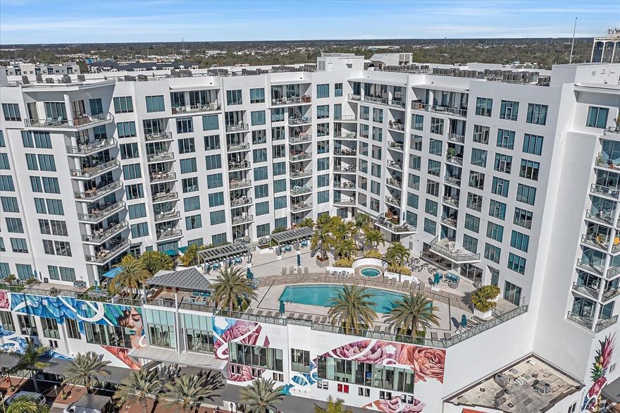 Welcome to The Mark, a contemporary residence located in the heart of downtown Sarasota. This sixth-floor corner condominium spans 2,112 square feet of interior living space with an additional 170-square-foot terrace offering panoramic city views. The open-concept floor plan integrates the kitchen, dining and living areas, all framed by 10-foot ceilings, motorized shades, ceiling fans and custom porcelain tile flooring.

The kitchen features an induction cooktop with hood, convection oven, microwave, tiled backsplash, RO drinking water system, French door refrigerator with ice and water dispenser and a large island for entertaining. Each of the three bedrooms includes a private ensuite bath, with the primary suite offering two closets (including a walk-in), a ceiling fan and a spa-inspired bath with dual vanities and a multi-head walk-in shower. A powder room, dedicated laundry room with full-size appliances and cabinetry, and a den designed for work or leisure complete the interior.

This 2019-built residence includes Cat-5 impact windows, Cat-5 ethernet wiring throughout and a secured storage space on the same floor. One reserved parking space is located in the third level of the secured garage. The building is outside of a designated flood zone.

Amenities at The Mark include a 60-foot resort-style pool with infinity edge, swim lane and full-length bench seating, a spa, two gas grills, gas firepit with lounge seating, fitness center with a spin/pilates room, a clubroom with full bar, large TVs and pool table, a business center and conference room for resident use. Residents benefit from 24/7/365 front desk staff, secured lobby access and overnight roving security. Enjoy immediate access to Sarasota’s renowned restaurants, shopping, arts venues and the harbor. The Mark – where downtown is downstairs.

SHOWINGS BEGIN MARCH 28, 2026 - Please refer to the Virtual Tour Link in the meantime.