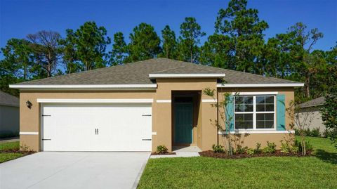 Photo of 1901 Deep Lake Circle, New Smyrna Beach, FL 32168 (MLS # O6409429)