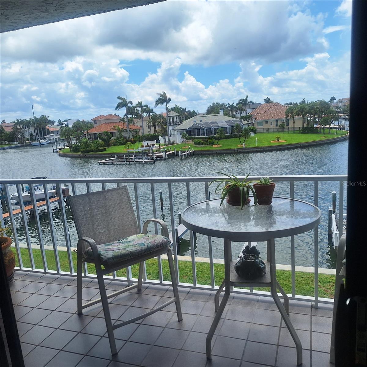 Waterfront Elegance in Tierra Verde – 2 bed 2 bath Priced to Sell!!!Welcome to your waterfront paradise—where every sunrise is spectacular, and every day feels like a vacation. Whether you're seeking a serene retreat or a savvy investment, this immaculate condo delivers the perfect blend of comfort, convenience, and coastal charm. Experience the best of coastal living in this beautifully updated, two-bedroom, two-bath condominium at Tierra I. Located on the second residential floor with elevator access, this turnkey residence ( Furniture Available) offers effortless waterfront living with stunning views, modern upgrades, and resort-style amenities. Spacious open-concept layout with abundant natural light and serene water views. Gourmet kitchen featuring stainless steel appliances, Granite countertops, recessed lighting, pantry, and premium wood cabinetry Inviting living and dining areas with ample space for entertaining and direct access to a private balcony. Primary suite room for a king-size bed, walk-in closet, en suite bath, and balcony access. The second bedroom is ideal for guests or a home office, with access to a fully updated hall bath. In-unit laundry closet on the balcony fits a full-size washer and dryer Assigned parking space (#203) and ground-level storage closet. Heated waterfront pool, fitness center, tennis/pickleball courts, and waterfront gazebo. Expansive fishing dock with water and electricity, plus access to an owner's Hobby Room. Boat slips are available for lease at just $85.00 a month from the Association. Tierra Verde is close to everything yet miles from the ordinary. Just steps from scenic bike trails leading to Fort De Soto Park. Minutes to Isla Del Sol Yacht & Country Club, St. Pete Beach, and Downtown St. Petersburg. Easy access to I-275 and the Sunshine Skyway Bridge—just 30 minutes to Tampa International Airport. Surrounded by natural beauty, wildlife preserves, and the pristine waters of Tampa Bay and the Gulf of America . Enjoy kayaking, paddle boarding, fishing, and dolphin and manatee sightings right from your backyard.
