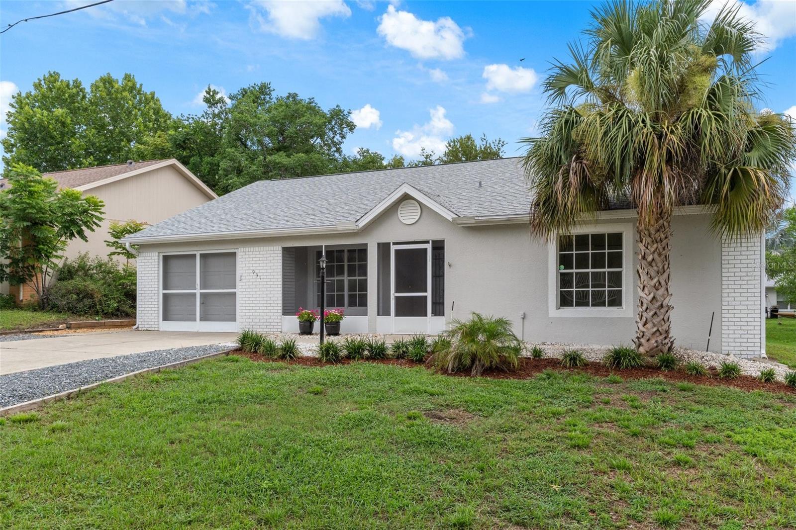 One or more photo(s) has been virtually staged. INCREDIBLE OPPORTUNITY! This nicely UPDATED 2-bedroom, 2-bathroom home with a CLIMATE-CONTROLLED SUNROOM is located in a desirable NON-HOA community. This home is perched 94 FEET ABOVE SEA LEVEL, ensuring peace of mind (safe from storm surge & no flood insurance required). All the major updates have already been completed, making this home truly MOVE-IN READY. Enjoy a FRESHLY PAINTED interior, NEW LUXURY VINYL PLANK (LVP) flooring throughout, updated light fixtures, a new garage door opener, and more. A NEW ROOF was installed in 2022, and the exterior was also freshly repainted. The HVAC system was replaced in 2018, and the water heater is newer as well. The spacious Great Room features vaulted ceilings and offers combined living and dining spaces with access to the sunroom through sliding glass doors. A second dining area, just off the kitchen, also opens to the sunroom. The kitchen includes a generous PANTRY and a conveniently located indoor laundry closet. The SPLIT FLOOR PLAN provides privacy, with two spacious bedrooms—both featuring walk-in closets. The primary suite includes an EN-SUITE BATHROOM with a walk-in shower. Step outside to an EXPANSIVE WOOD DECK & PAVER PATIO —perfect for outdoor entertaining, morning coffee, or evening relaxation. The oversized one-car garage includes extra space for storage, and the expanded driveway offers additional parking. A screened front porch provides a sheltered welcome for guests. Additional features include a kayak rack on the east side of the house, which can stay or go—your choice! Conveniently located in the heart of Beverly Hills, just 1.5 miles away from Target, Walmart, Aldi, Publix, Hobby Lobby, Pet Smart, and more, plus various restaurants. Access quaint downtown Inverness in just 20 minutes, and Crystal River is 15 minutes away. The natural beauty of Florida’s Nature Coast is all around for your enjoyment. Drive to Disneyworld in just 80 minutes, while the Tampa Airport is only an hour via the Suncoast Parkway, along with all that greater Tampa Bay has to offer! Access to great healthcare too: 2 Local area hospitals, and more in Ocala. Tampa General Hospital (TGH) Free Standing Emergency Center is less than 2 miles away, and a new TGHospital is being built next door! The area VA Clinic is one mile, U of F Shands Teaching Hospital is 80 minutes away in Gainesville, and Moffit Cancer Center is in Tampa; plus there are various specialty doctors in the area. Truly a wonderful location with easy access to so much, yet still a small town. Don’t miss out—schedule your private showing today!