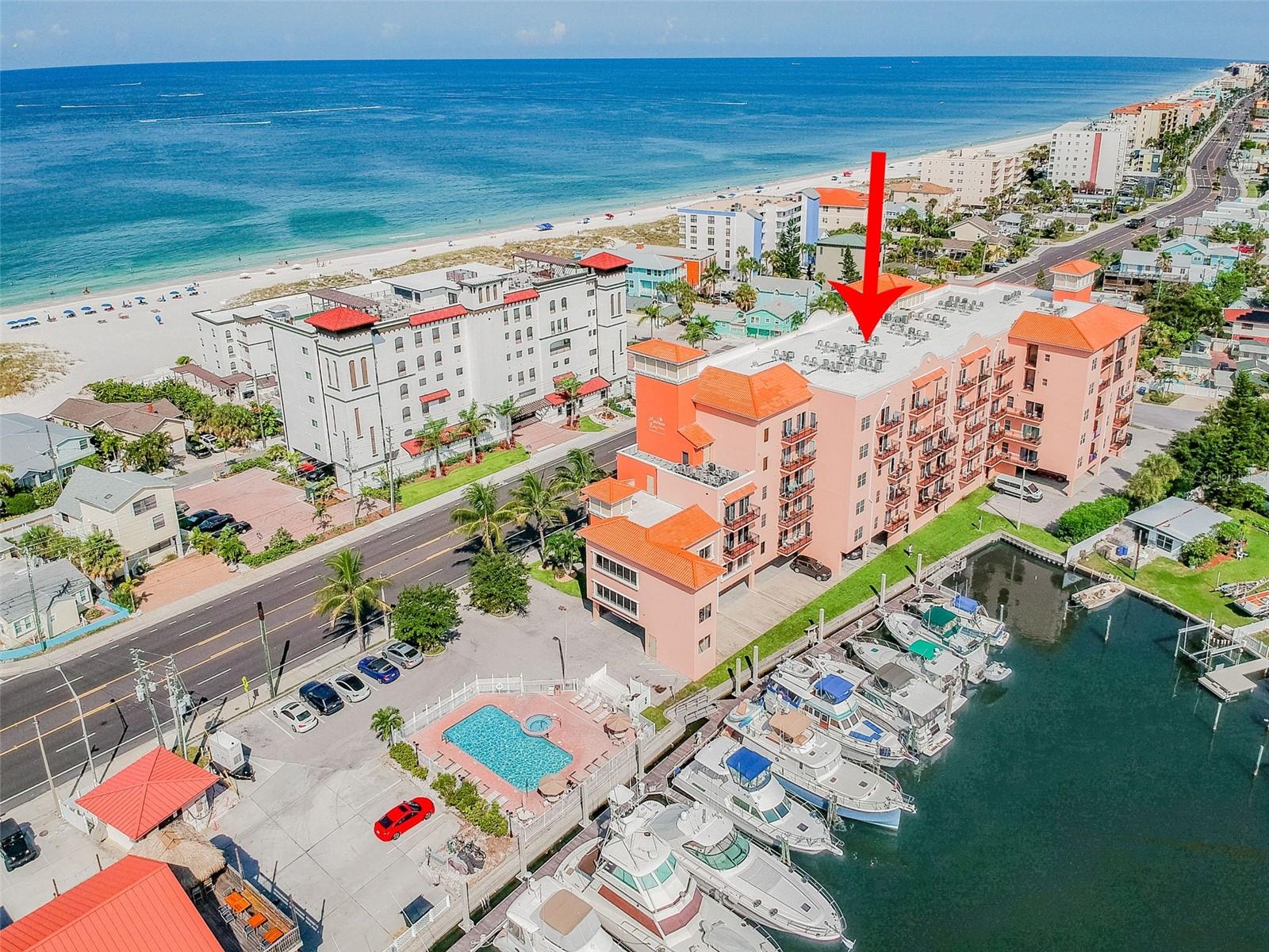 GULF OF AMERICA ... GULF OF AMERICA... GULF OF AMERICA ...STEPS AWAY!!!! WATERVIEW GALORE of the intercoastal!!!!! VIEWS FROM EVERY ROOM!!!! ASK ABOUT THE YEARLY INCOME POTENTIAL!! Breath taking views of the glistening intercoastal! Private balcony to enjoy the mini yachts that parade daily! Fabulous location perfected situated across from the GULF OF AMERICA in the popular Madeira Beach!! BEACH LOVERS will fall in love with this impressive condominium! Madeira Beach was voted one of the TOP 10 beaches in 2021!! One of the most popular things to do in Madeira Beach is to explore John’s Pass. This entertainment and business district is Madeira Beach’s busiest spot. Here you can find all sorts of restaurants and shops overlooking the water! Condo is FULLY FURNISHED!! Impressive OPEN FLOOR PLAN! Gorgeous updated flooring , stainless steel appliances and plenty of entertaining space! ALL APPLIANCES CONVEY...even the WASHER / DRYER!!! Kitchen space bar adds additional seating....all topped with gorgeous GRANITE! GLASS BACKSPLASH TILE ... GORGEOUS!! Living room is plentiful for a family/friend gathering to enjoy a movie night after a fun day at the beach! Sit back from your sofa and enjoy the marina and waterfront! Primary retreat has ample of space to accommodate a King Bed....STUNNING WATERVIEWS of the intercoastal ! Plenty of closet space for linens and toiletries. INGROUND POOL overlooking the marina and waterways !! FITNESS ROOM for your morning fitness ! Deeded a condo / hotel .... built in property management company to take over being your very own personal property manager! MADEIRA BAY RESORT II has truly made owning a condo / hotel a breeeeeeeeeeeze!!!!!!!!!!!!!!! Making income while enjoying being a Madeira Beach waterfront condominium owner! INCOMING PRODUCING & WATERFRONT BONUS!!!!!!!!!!