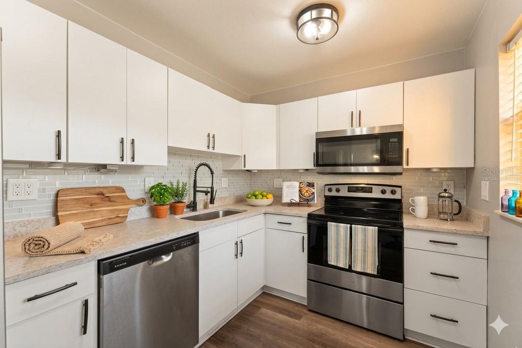 Photo of 3034 Eastland Boulevard #D104, Clearwater, FL 33761 (MLS # TB8482206)