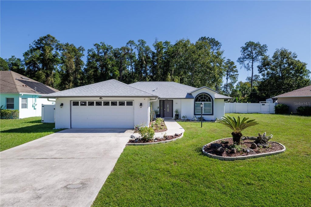 Photo of 42 Zaun Trail, Palm Coast, FL 32164 (MLS # FC322125)