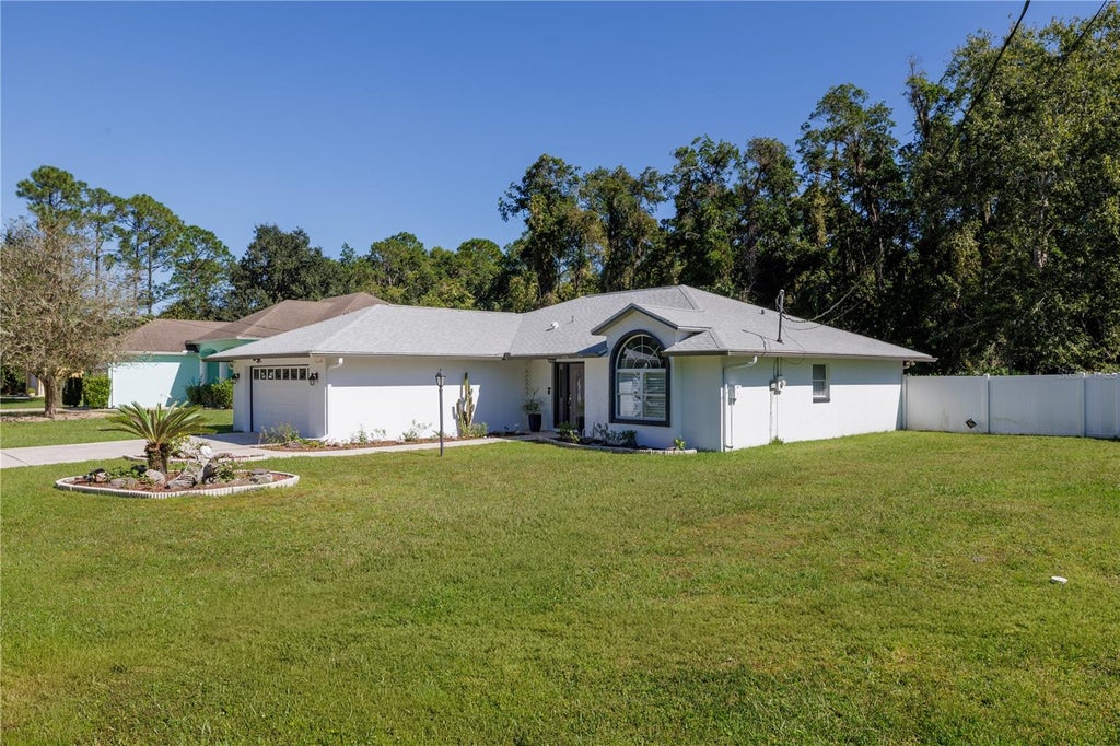 Photo of 42 Zaun Trail, Palm Coast, FL 32164 (MLS # FC322125)