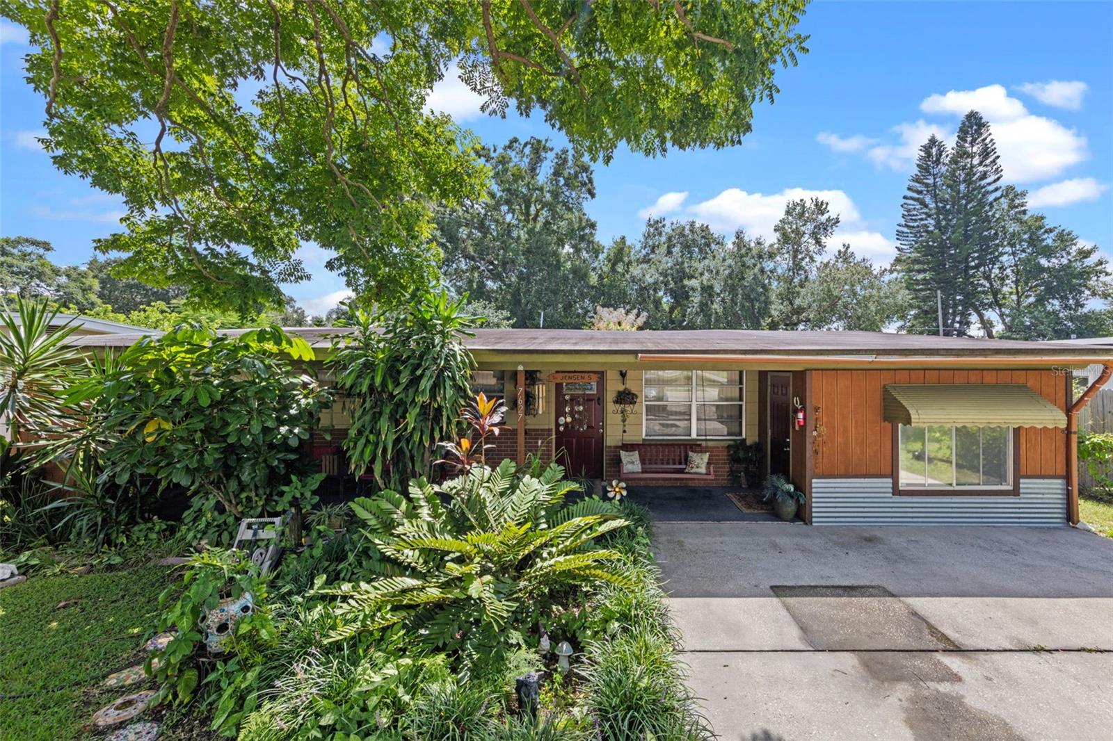 Charming, one story, single family home nestled in a very desirable neighborhood and conveniently located near popular theme parks, shops, restaurants, local conveniences and the Florida Mall. It is also not far from downtown Orlando, Lake Nona, MCO Airport, and other popular attractions, and a short drive from Orlando’s nearest beaches. What makes the property most distinctive is that it is situated right across the way from Lake Conway, one of the most well-known and highly coveted freshwater lakes for recreation, larger homes and some of the oldest Florida homes. It is also only one of Orlando’s largest and most clear lakes, and its beauty can be enjoyed from the public access area right from the front of the house. Zoned R-1A / single family residential, the house has 2 bedrooms and 1 bathroom for residential homeowner enjoyment / as your own home. The main house has 2 bedrooms and 1 bath. Attached to the main house are two rental units with their own entrance, which could be used for residential living as well as rented to help with the backyard homes combined, the tranquility of the neighborhood, and the ease of income with tenants currently bringing in steady income, the property can be an excellent investment for a new or first time investor, or for seasoned families looking to buy a home and later benefit in the benefit of rental income. With separate entrances, each tenant enjoys their own private outdoor entrance and space. The backyard is well maintained and there is ample room for entertaining and barbecue area. With the house across from the property is nestled on a 161 shed with a small shed and raised garden beds. The home is a harmonious blend of comfortable living space and potential income, suitable for varied lifestyles.