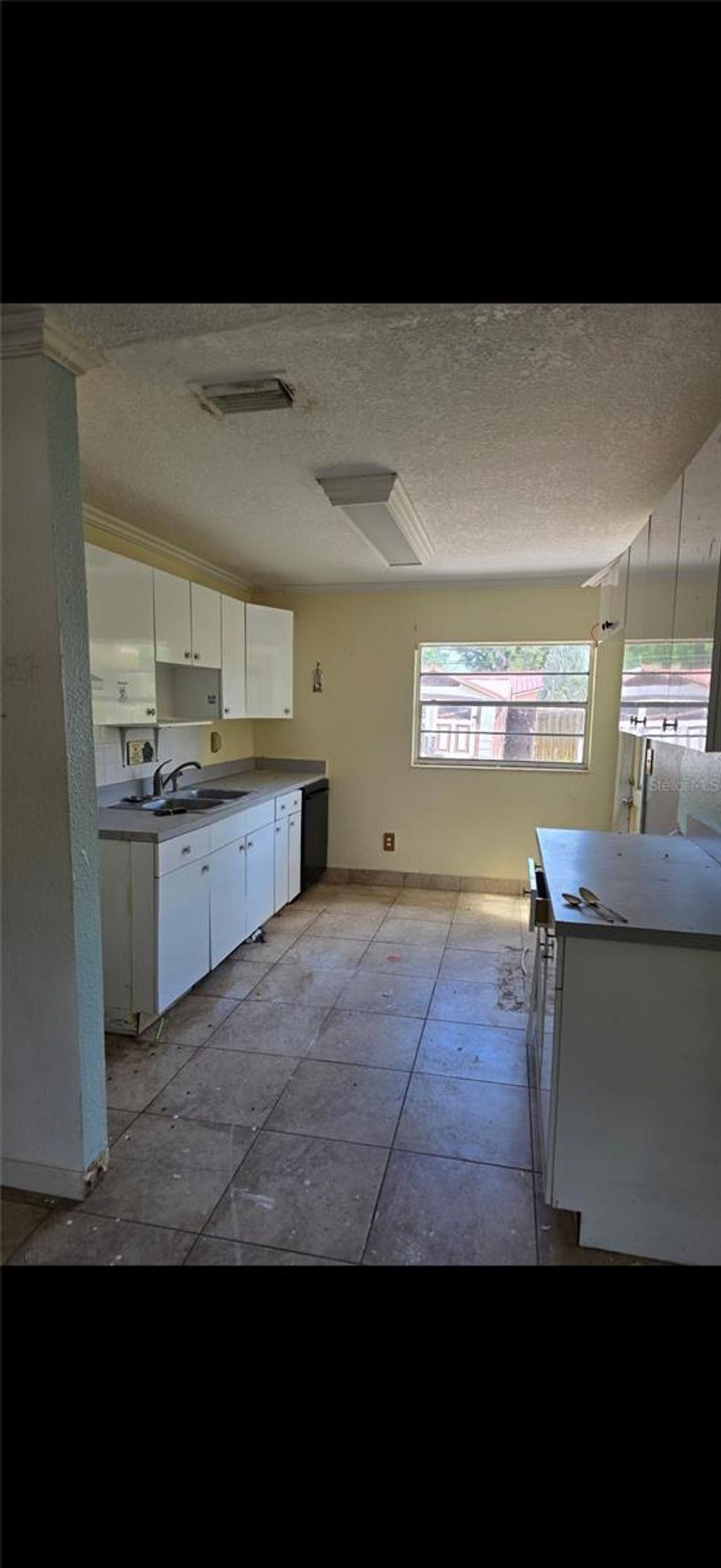 Photo of 2712 E 99th Avenue, Tampa, FL 33612 (MLS # O6403445)