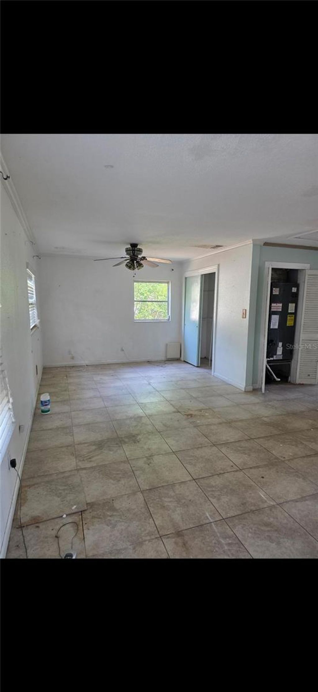 Photo of 2712 E 99th Avenue, Tampa, FL 33612 (MLS # O6403445)