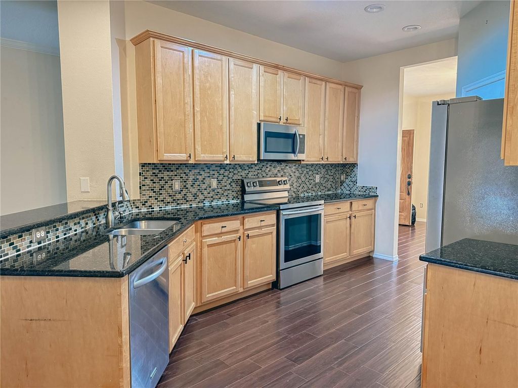 Photo of 1042 Drift Creek Cove, Orlando, FL 32828 (MLS # O6410202)
