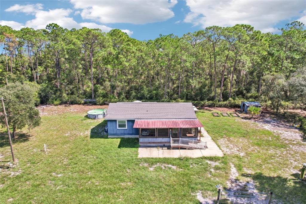 Photo of 33510 Western Ave, Leesburg, FL 34788 (MLS # O6449578)
