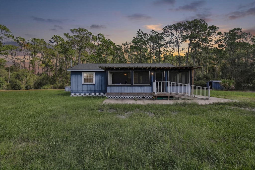 Photo of 33510 Western Ave, Leesburg, FL 34788 (MLS # O6449578)