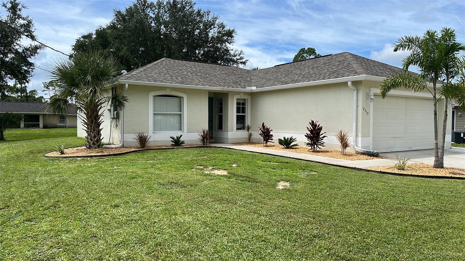 Delightful 3-bedroom, 2-bathroom house available for long-term lease! Nestled in a pleasant neighborhood and an A-rated school district, and featuring an open, split-bedroom floor plan, this home offers a spacious great room that seamlessly combines living and dining areas, leading directly to a covered and screened lanai — perfect for entertaining year-round. The backyard backs up to a serene greenbelt, providing extra privacy and a peaceful setting. The charming kitchen boasts wood cabinets, stainless steel appliances, and a cozy eating area. Located in North Port, this home is not in a flood zone and offers plenty of outdoor space to enjoy Florida living at its best. You’ll love the convenient location, with easy access to beautiful beaches, boating, golf, shopping, dining, and more. 12-month rental term.