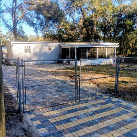 Photo of 5851 SE 162 Terrace, Ocklawaha, FL 32179 (MLS # O6375154)