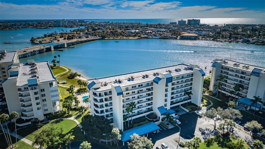 Rarely available Penthouse unit with panoramic Intracoastal and Gulf views. Baywatch at Harbourside in South Pasadena. Beautiful updated unit with two bedrooms plus den, two full baths, and 1,910sq.ft. of living area. Spectacular water views across the rear. In 2020 major renovations with all new luxurious master bath suite, new second bathroom, and kitchen remodeled with walls being removed. 30ft. rear balcony with Southern exposure offering year round balcony time. Sit and enjoy the active Intracoastal waterway, the Corey Causeway Bridge, Fireworks, boat parades, and endless hours of Mother nature with Dolphins, Manatees, Ospreys and more. Other features: granite tops in kitchen with newer appliances, hurricane windows and sliders, plantation shutters, inside laundry with new washer washer and dryer, two newer A/C systems, 9ft. ceilings through out, wet bar in living room, hurricane shutters, one garage parking space and one covered parking space and so much more! Harbourside community is gated with 24 hour security, a 1.6 mile waterfront walking trail, marina with 87 boat slips (available at times for rent or purchase), kayak racks, multiple heated pools, heated spa, men and women's separate gyms, tennis courts, pickle ball courts, shuffleboard courts, gas grills, car washing station with free air and vac, charging stations for electric cars, a recently renovated Clubhouse with endless activities along with library, billiards room, work shop, and more. This South Pasadena location is a short stroll to the beautiful Gulf Beaches, Interstate 275, and vibrant downtown St. Petersburg. Harbourside is pet friendly and allows units to be rented with a three month minimal rental period. Come live in one of the very nicest and well built communities in all of Pinellas County. Be sure to vies the beautiful virtaul tour.