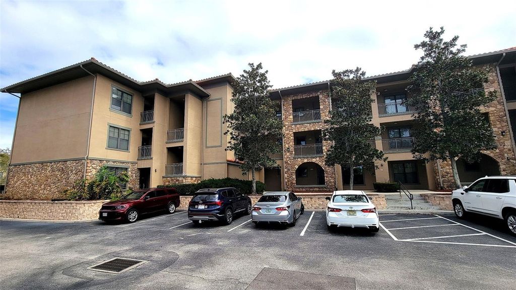 Photo of 914 Charo Parkway #123, Davenport, FL 33897 (MLS # S5146051)