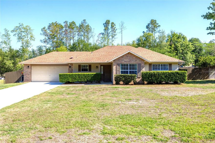 This well-maintained home, built in 1997, has been lovingly cared for and it shows. The open floor plan creates a welcoming space that’s perfect for entertaining family and friends or simply enjoying everyday living.  The kitchen is thoughtfully designed for both functionality and convenience, featuring quartz countertops, generous prep space, and abundant storage to keep everything within easy reach. Its seamless connection to the family room allows you to stay part of the conversation while cooking or hosting.  French doors in the dining room open to a screened porch overlooking the expansive backyard, making it easy to enjoy indoor-outdoor living and treat the porch as an extension of the home.  The spacious primary suite includes a walk-in closet and a private bath with a separate powder area and shower. Bedrooms two and three are located down the  hall near the second full bath, offering comfort and privacy for family or guests. The garage is equipped with shelving and cabinets to help keep everything organized. Situated on a half-acre lot, the home is set back from the road, providing added privacy and a peaceful setting.  Added storage in the shed in the back – complete with electric.