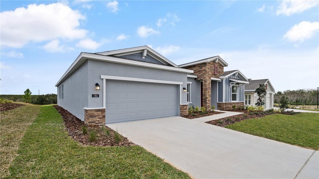 Photo of 186 Puma Loop, Groveland, FL 34736 (MLS # C7531213)