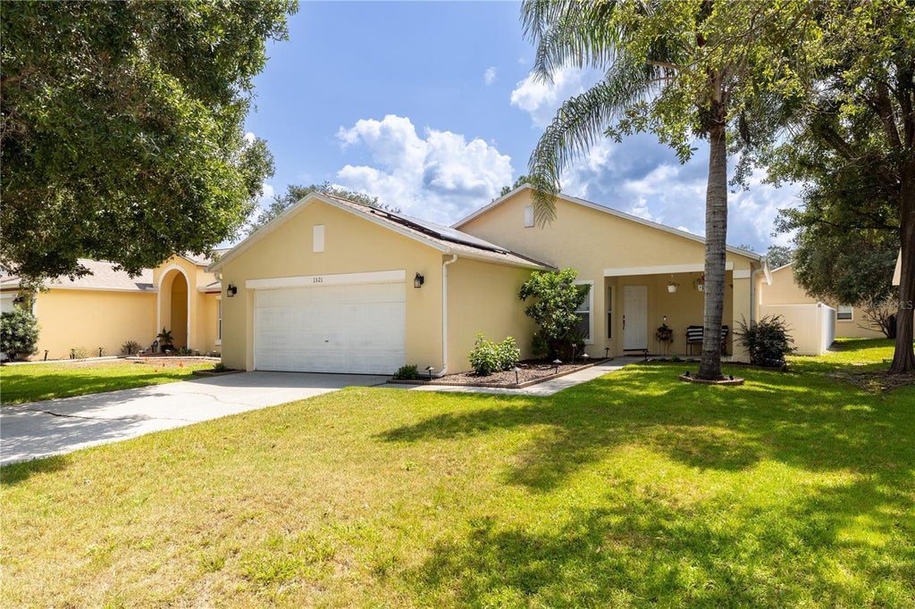 Photo of 1321 Whitewood Way, Clermont, FL 34714 (MLS # O6435822)