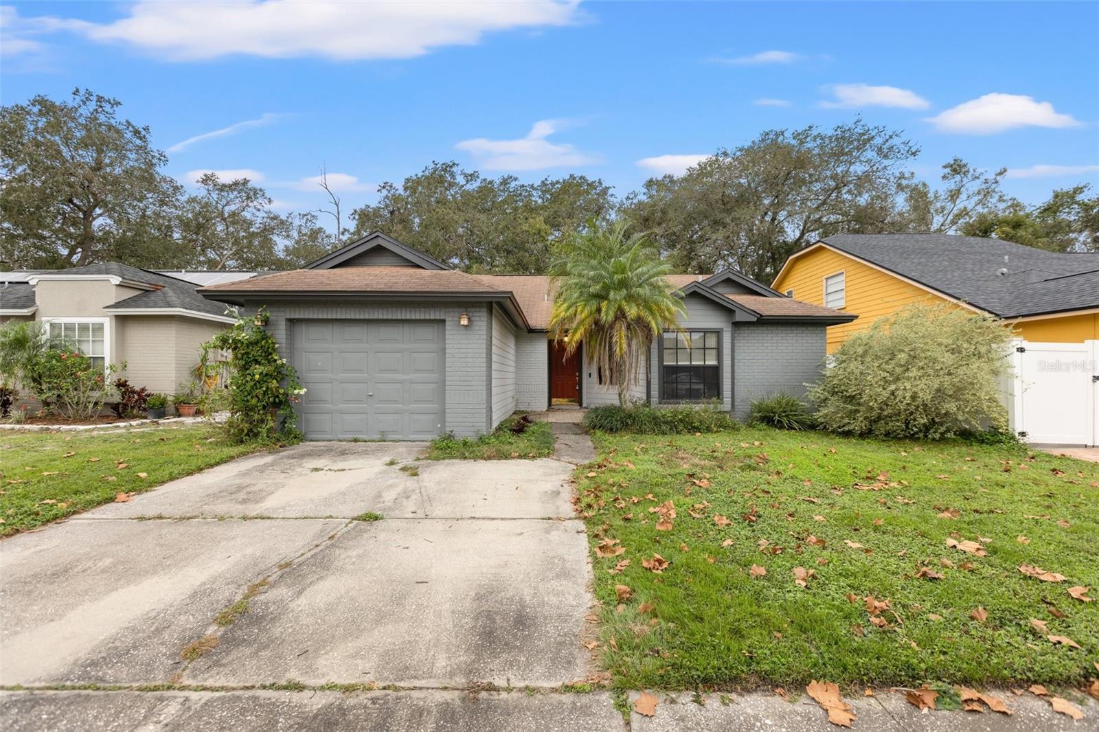 Welcome home to this spacious and inviting 3-bedroom, 2-bathroom residence located in an intimate neighborhood just minutes from all the Carrollwood hot spots. This home features an open floor plan with vaulted ceilings, a formal dining room, and a cozy breakfast nook — perfect for entertaining or everyday living. The primary bedroom includes a private en-suite bathroom for your comfort and convenience. Enjoy the outdoors in the fully fenced backyard, complete with a storage shed for extra space. A one-car garage adds even more practicality. The neighborhood offers fantastic amenities including a playground, tennis courts, and a soccer field. Located just minutes from Publix, top gyms, shopping, and dining — and only 20 minutes to Downtown Tampa — this home offers the perfect balance of comfort and convenience. Pets are allowed! Don't miss out — schedule your showing today!