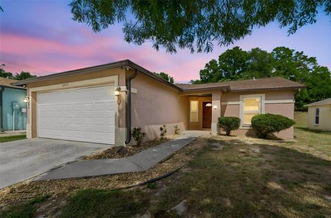 Photo of 8445 N River Dune Street, Tampa, FL 33617 (MLS # TB8505971)