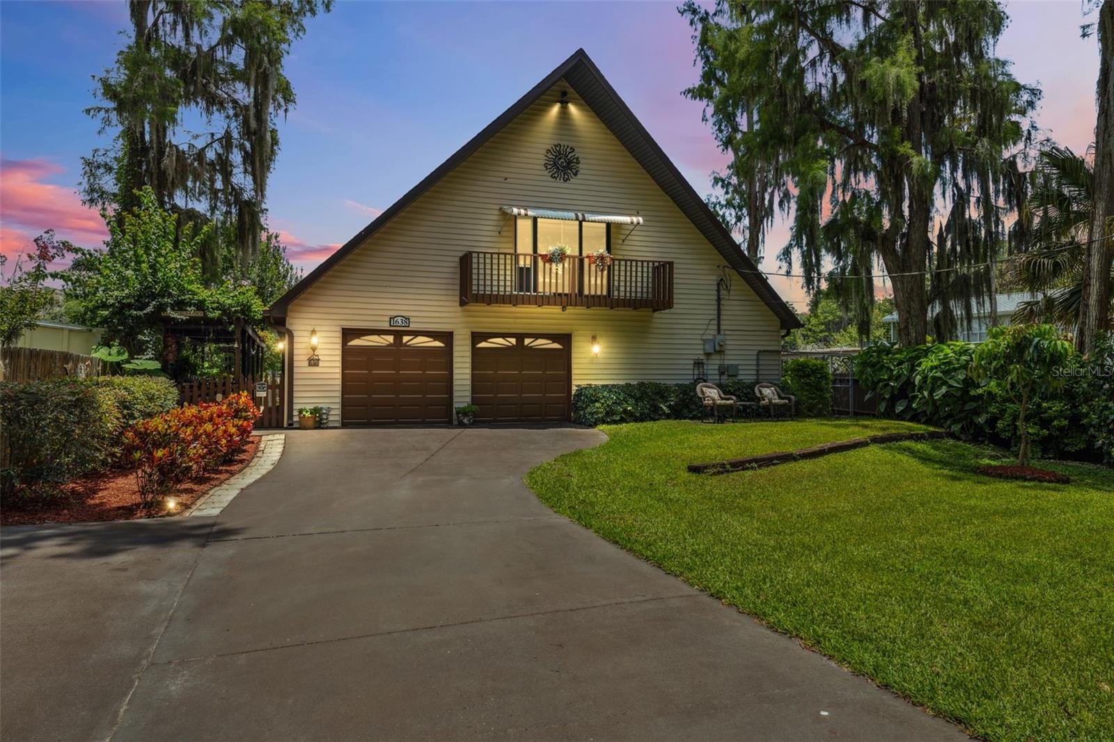 Welcome to lakefront living at its finest! This stunning 3-bedroom, 3-bath home with a 2-car garage is nestled in the highly sought-after, gated community of Holiday Club a private enclave featuring access to a pristine chain of three ski lakes, including beautiful Lake Ann.
Enjoy breathtaking water views and modern comforts throughout. The primary suite boasts a spacious walk-in closet with a built-in safe, offering both luxury and peace of mind. Thoughtfully updated, the home features Pella windows and doors, a 2-year-old roof, water softener, and a whole-house water purification system. This golf cart-friendly community offers resort-style amenities including a community park, private boat ramp, and top-rated schools nearby perfect for both full-time residents and weekend getaways. Opportunities like this in Holiday Club don’t come often. Come see what true lakefront luxury feels like—schedule your private tour today!