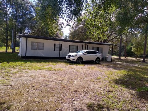 Photo of 8488 SE 126th Place, Belleview, FL 34420 (MLS # S5153236)