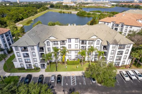 Photo of 4102 Breakview Drive #40203, Orlando, FL 32819 (MLS # O6417542)