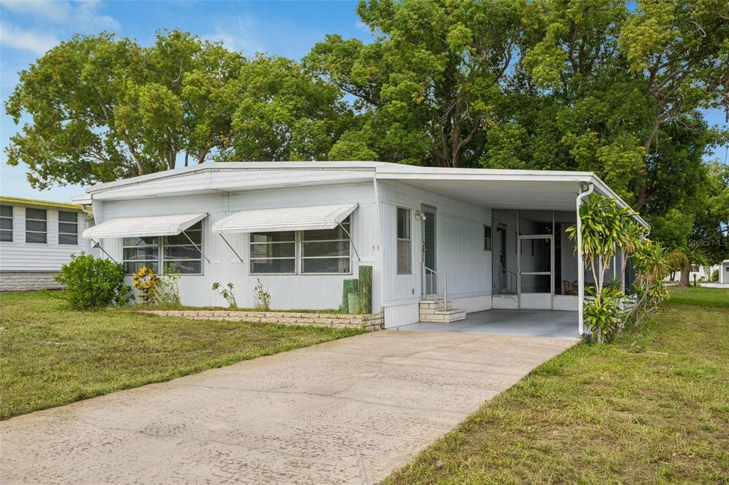 Photo of 55 Lexington Court #12, Palm Harbor, FL 34684 (MLS # TB8544435)